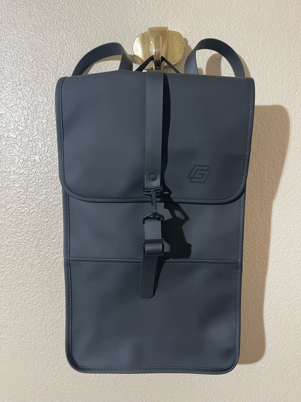 Rains Matte Black Urban Rolltop Backpack